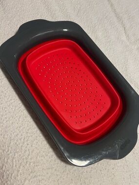 Collapsible Red Silicone Colander with Gray Rim